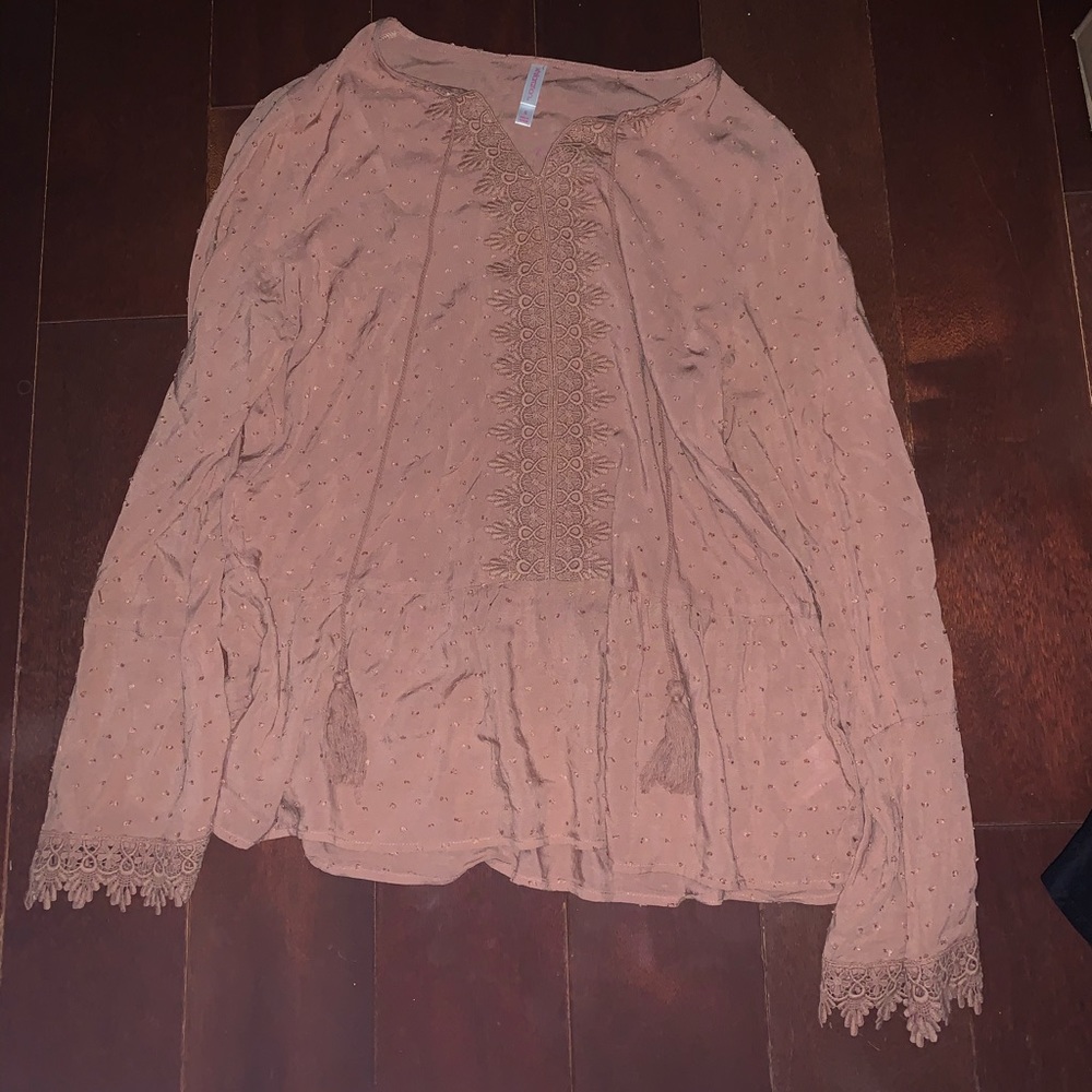pink long sleeve top with v neck with tassels!